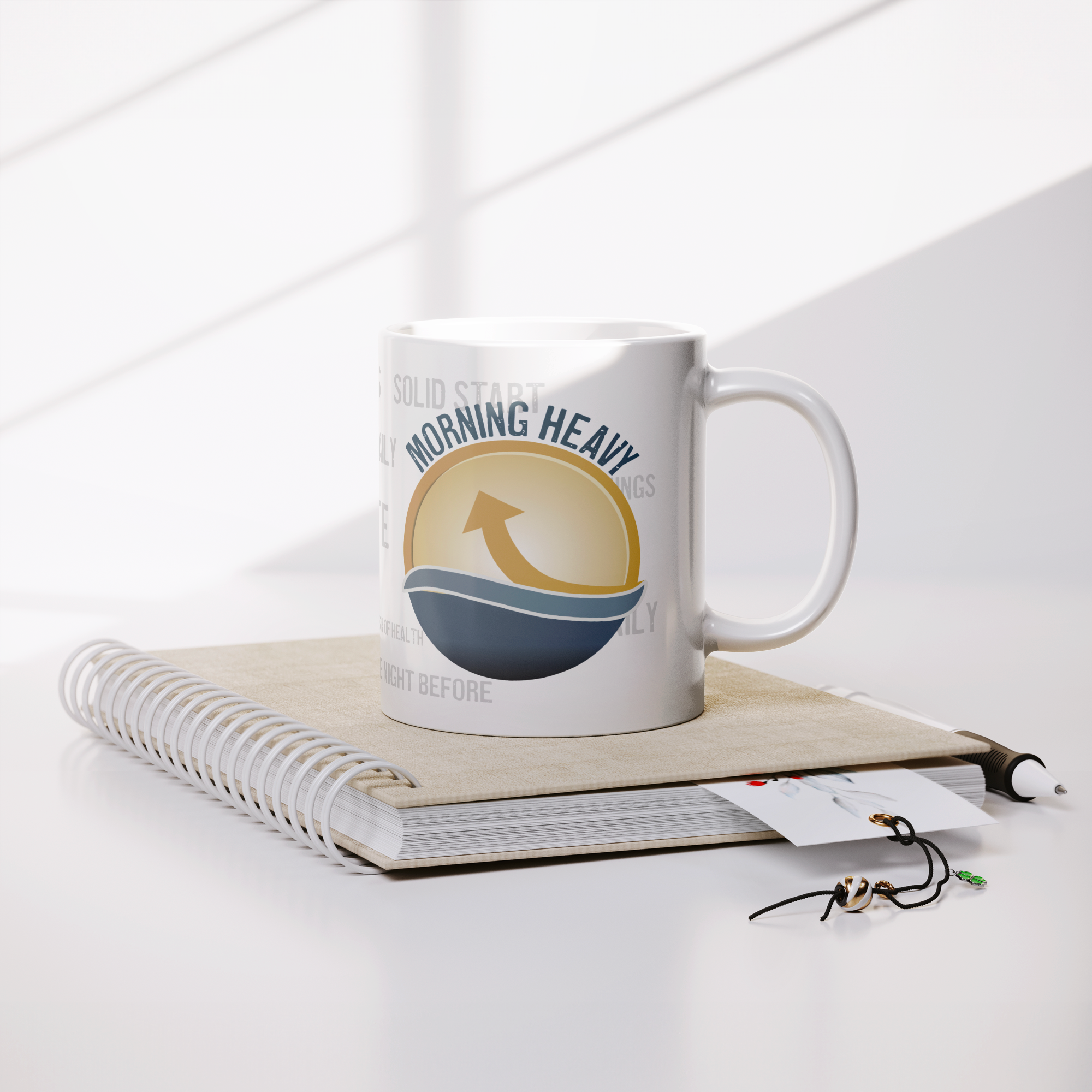 11oz_Morning_Heavy_Motivation_Mug_Lifestyle_Notebook_Mockup.png_15386509